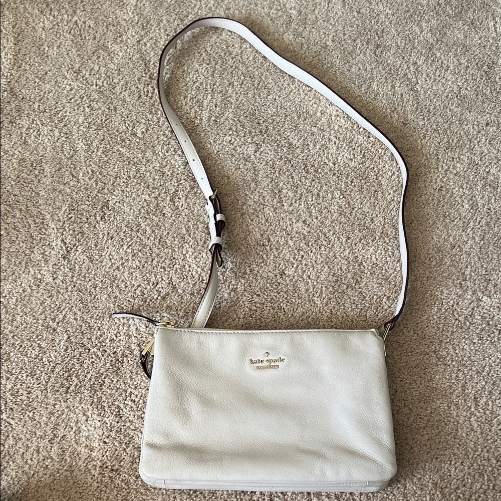 Kate Spade Cream Crossbody Bag.  Like new condition.  No scratches or stains.